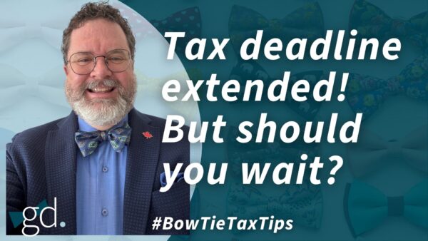 Man with whitish beard and glasses with bow tie in blue shirt and suit jacket talking about the 2025 tax deadline extension